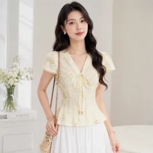 &Aacute;o kiểu nữ tơ dập in hoa cổ V thắt nơ